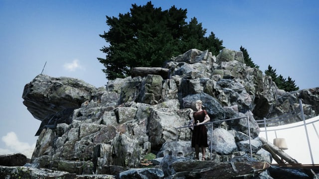 Ein VR-Bild, wo eine Frau an einer Steinwand steht