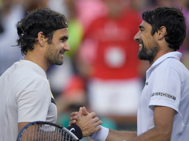 Roger Federer und Jérémy Chardy. Roger Federer und Jérémy Chardy.