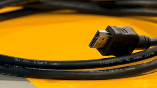 Ein zusammengerolltes HDMI-Kabel Ein zusammengerolltes HDMI-Kabel
