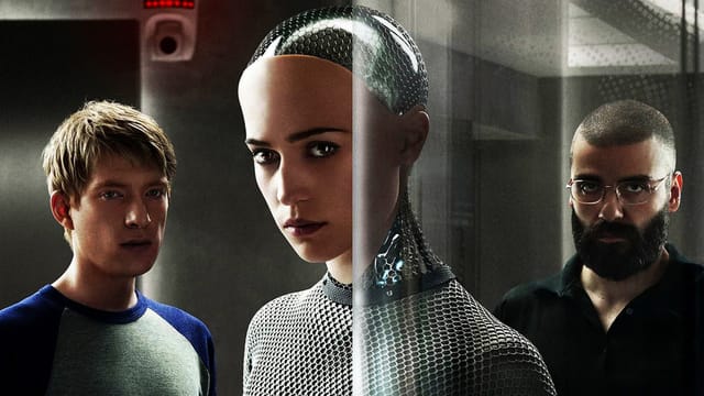 1 Roboter, zwei Menschen. 1 Roboter, zwei Menschen.