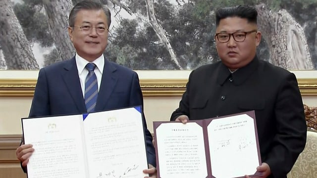 Südkoreas Präsident Moon Jae-in und Nordkoreas Machthaber Kim Jong-un. Südkoreas Präsident Moon Jae-in und Nordkoreas Machthaber Kim Jong-un.