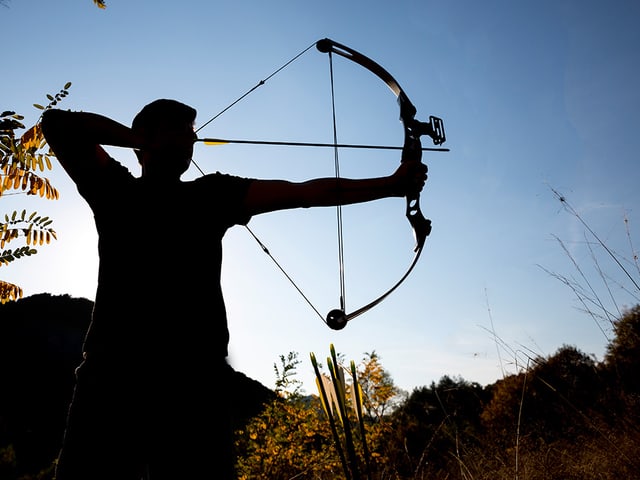 Silhouette eines Bogenschützen. Silhouette eines Bogenschützen.