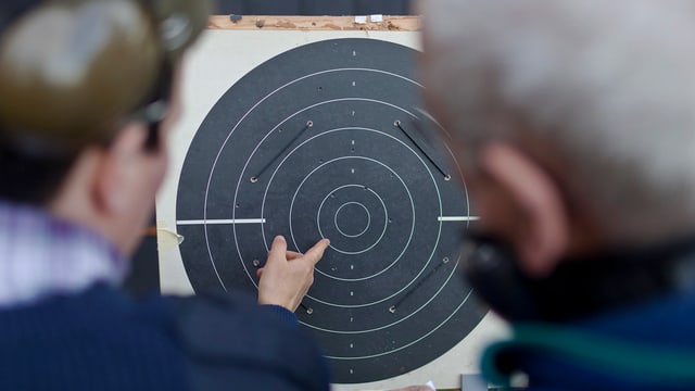 Zielscheibe und Schützen Zielscheibe und Schützen
