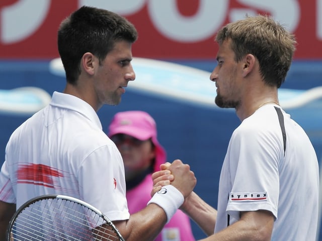 Novak Djokovic und Marco Chiudinelli. Novak Djokovic und Marco Chiudinelli.