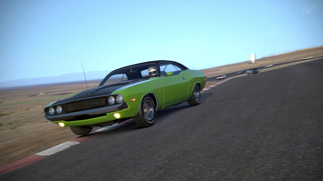 Ein 70er Dodge Charger in grün auf dem Randstein. Ein 70er Dodge Charger in grün auf dem Randstein.