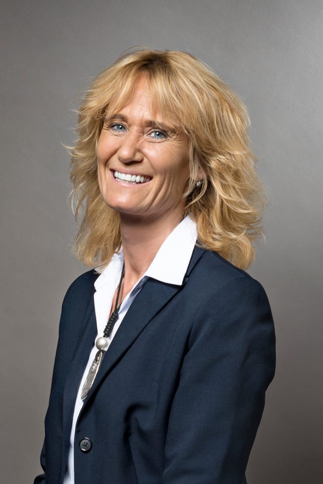 Eine Portraitaufnahme einer Frau Eine Portraitaufnahme einer Frau