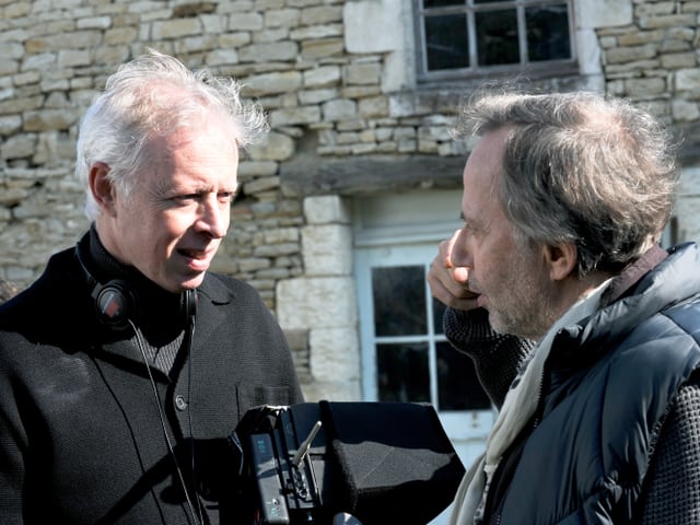 Regisseur Philippe La Guay neben dem Schauspieler.
