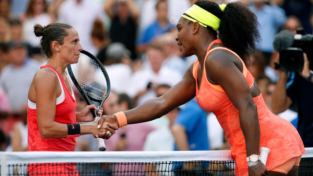 Vinci und Williams beim Handshake. Vinci und Williams beim Handshake.
