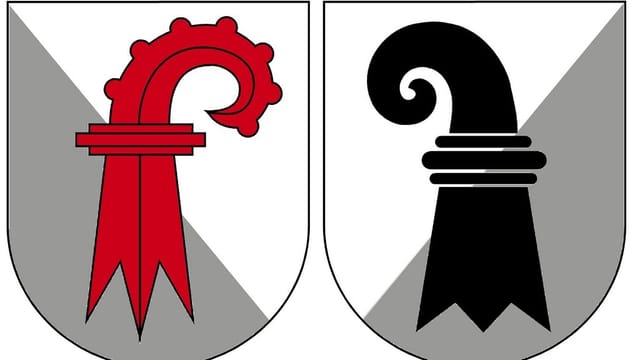 Die Kantonswappen von Basel-Stadt und Baselland. Die Kantonswappen von Basel-Stadt und Baselland.