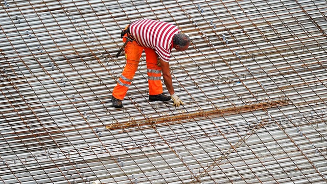 Bauarbeiter in Arbeitskleidung Bauarbeiter in Arbeitskleidung