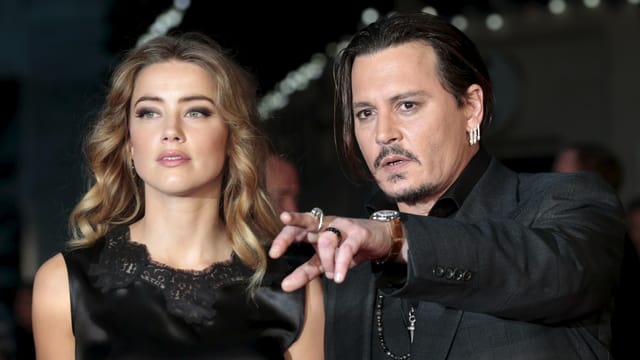 Amber Heard und Johnny Depp. Amber Heard und Johnny Depp.