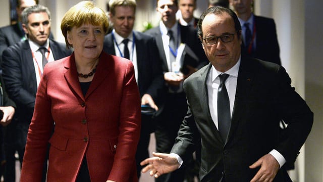 Die deutsche Kanzlerin Merkel und Frankreichs Präsident Hollande treffen beim EU-Gipfel ein Die deutsche Kanzlerin Merkel und Frankreichs Präsident Hollande treffen beim EU-Gipfel ein