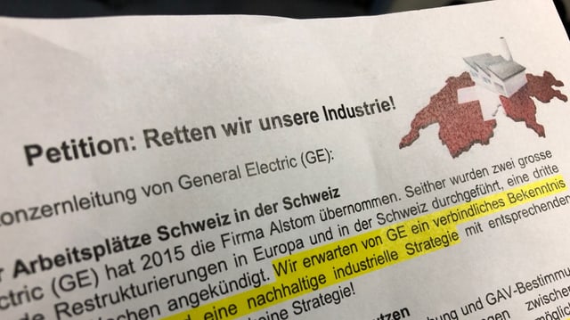 Nahaufnahme der Petition mit Logo Nahaufnahme der Petition mit Logo