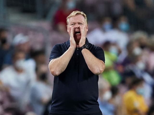 Ronald Koeman schreit aufs Spielfeld. Ronald Koeman schreit aufs Spielfeld.
