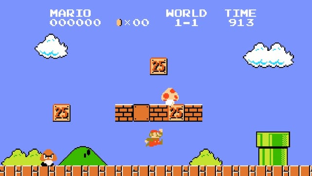 Szene aus dem alten Videospiel "Super Mario": Eine Figur hüpft durch eine pixlige Landschaft Szene aus dem alten Videospiel "Super Mario": Eine Figur hüpft durch eine pixlige Landschaft
