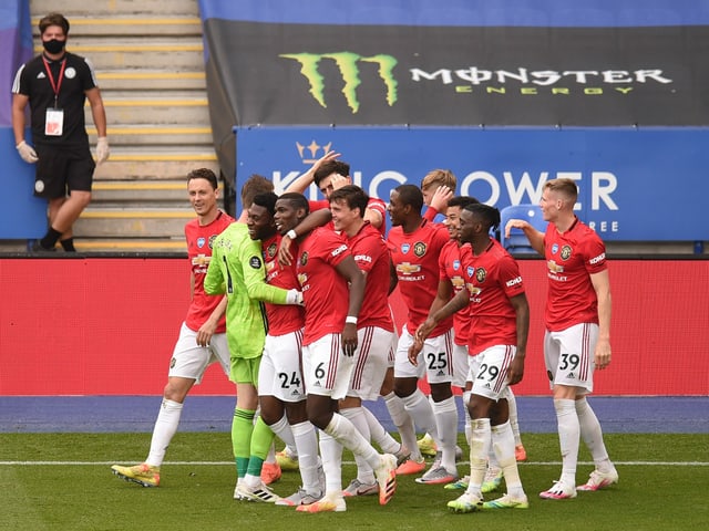 Manchester-United-Spieler bejubeln ein Tor. Manchester-United-Spieler bejubeln ein Tor.
