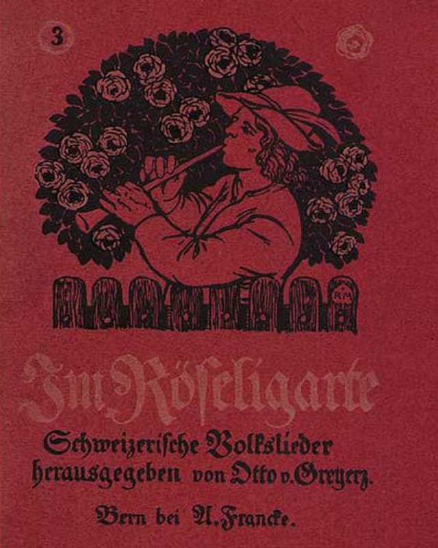 Schwarzer Druck auf rotem Grund: Ein Mann mit Hirtenhut spielt vor einem Rosenbusch auf seiner Hirtenflöte. Schwarzer Druck auf rotem Grund: Ein Mann mit Hirtenhut spielt vor einem Rosenbusch auf seiner Hirtenflöte.