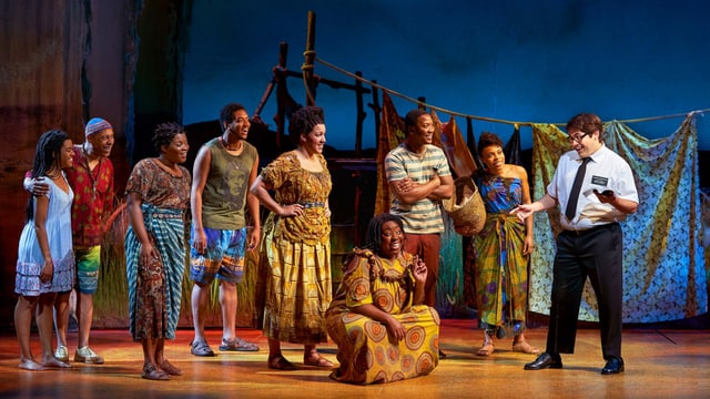 Ein Bild aus dem Musical "The Book of Mormon". Ein Bild aus dem Musical "The Book of Mormon".