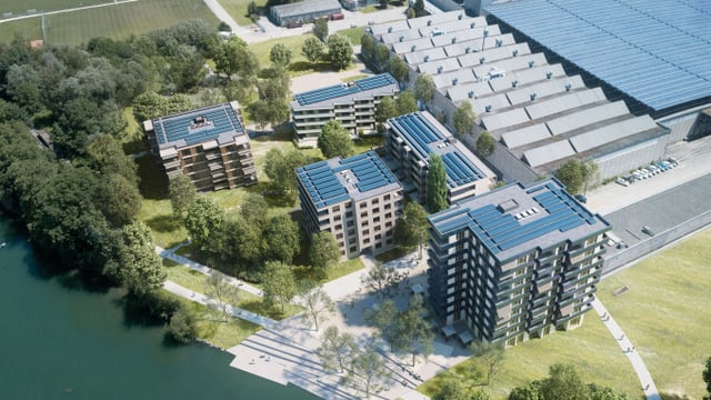 Luftaufnahme bzw. Visualisierung, im Vordergrund neue Wohnblöcke, im Hintergrund grosse Fabrikhallen Luftaufnahme bzw. Visualisierung, im Vordergrund neue Wohnblöcke, im Hintergrund grosse Fabrikhallen