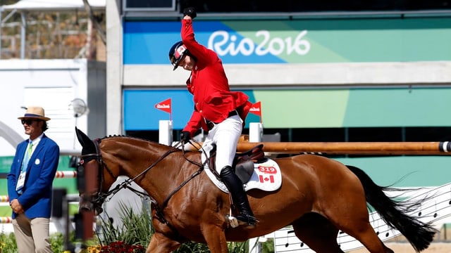 Eric Lamaze jubelt im Sattel von Fine Lady 5. Eric Lamaze jubelt im Sattel von Fine Lady 5.