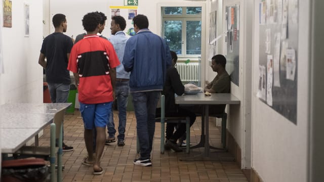 Asylbewerber in einer Unterkunft. Asylbewerber in einer Unterkunft.