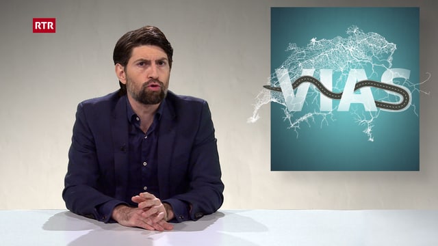 Michel Decurtins sper ina grafica che mussa la rait da vias svizra cun scret surora "Vias". Michel Decurtins sper ina grafica che mussa la rait da vias svizra cun scret surora "Vias".