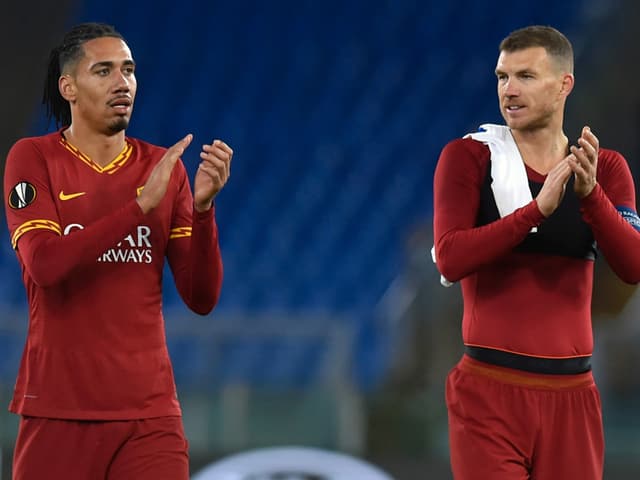 Chris Smalling und Edin Dzeko. Chris Smalling und Edin Dzeko.