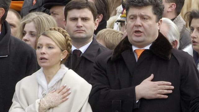 Poroschenko mit Timoschenko im Jahr 2005. Poroschenko mit Timoschenko im Jahr 2005.