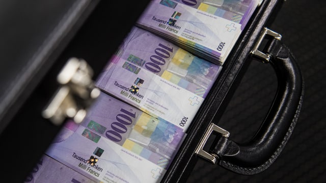 Banknoten in Koffer. Banknoten in Koffer.