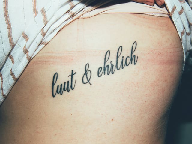Tattoo eines Hecht-Fans