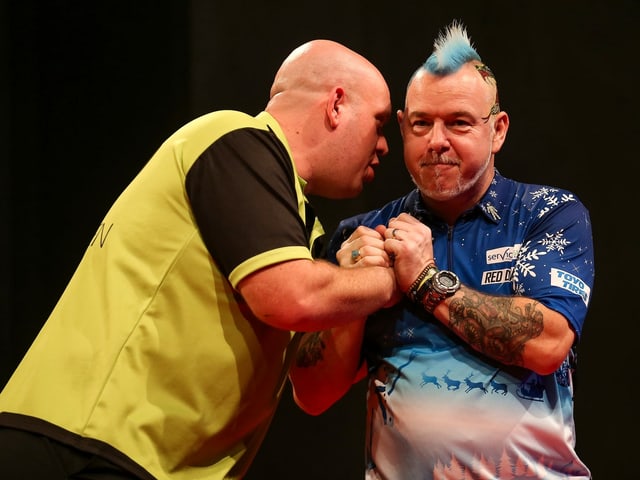 Michael van Gerwen (links) und Peter Wright. Michael van Gerwen (links) und Peter Wright.