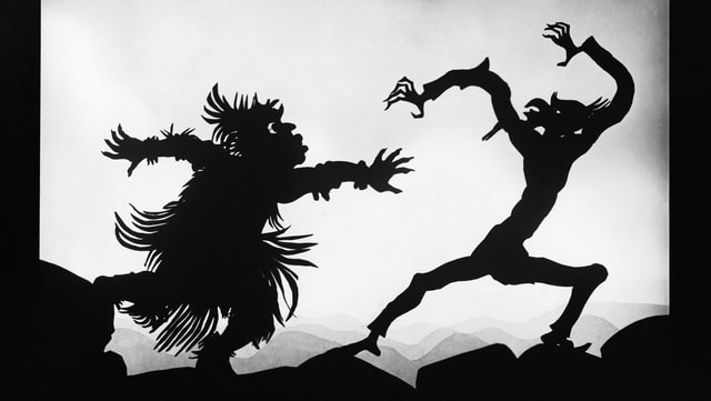 Scherenschritt: Monster greift Mann an Scherenschritt: Monster greift Mann an