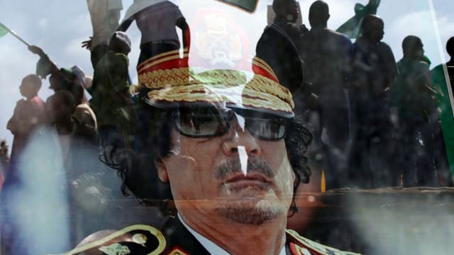 Gadaffi auf einem Transparent von Demonstranten. Gadaffi auf einem Transparent von Demonstranten.