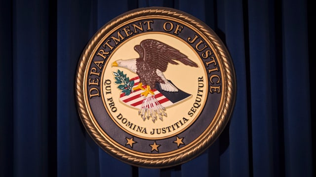 Amtliches Siegel des US-Justizdepartements (DOJ) Amtliches Siegel des US-Justizdepartements (DOJ)
