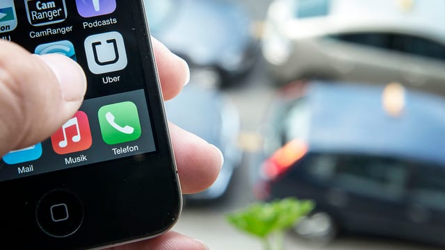 Uber-App auf einem Handy Uber-App auf einem Handy