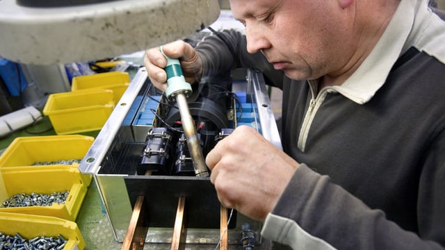 Arbeiter am arbeiten. Arbeiter am arbeiten.