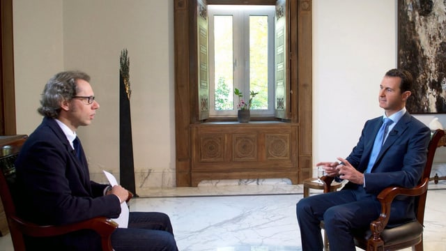 Ein Journalist interviewt Baschar al-Assad Ein Journalist interviewt Baschar al-Assad