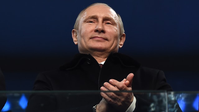 Putin in Grossaufnahme, er klatscht in die Hände. Putin in Grossaufnahme, er klatscht in die Hände.