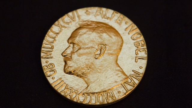 Goldene Münze mit Alfred Nobel Goldene Münze mit Alfred Nobel