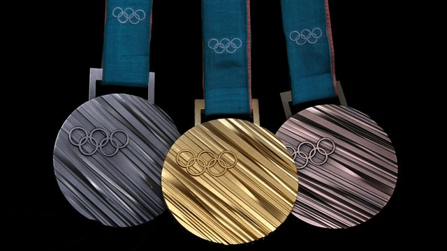 Die Gold-, Silber- und Bronzemedaille von Pyeongchang in einer Reihe. Die Gold-, Silber- und Bronzemedaille von Pyeongchang in einer Reihe.