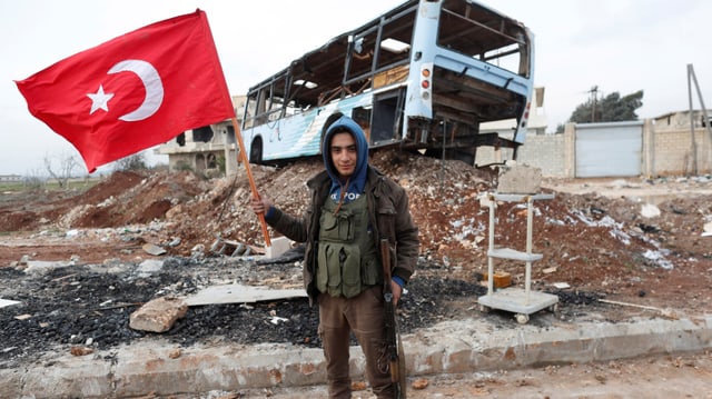 Ein Soldat der Freien Syrischen Armee. Ein Soldat der Freien Syrischen Armee.