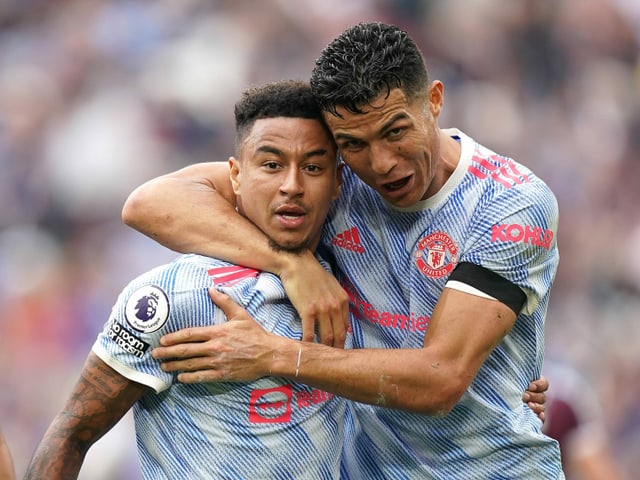 Jesse Lingard und Cristiano Ronaldo jubeln. Jesse Lingard und Cristiano Ronaldo jubeln.