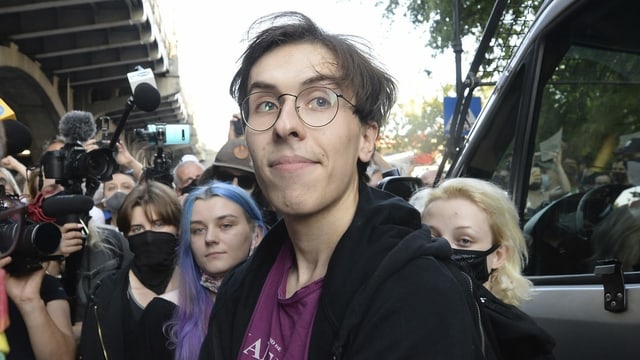 Activist Malgorzata Szutowicz, center, known as Margot, before being arrested in Warsaw, Poland, on Friday Aug. 7, 2020. LGBT rights activists scuffled with police Friday in Warsaw after turning out on the streets to protest the arrest of an an activist. Activist Malgorzata Szutowicz, center, known as Margot, before being arrested in Warsaw, Poland, on Friday Aug. 7, 2020. LGBT rights activists scuffled with police Friday in Warsaw after turning out on the streets to protest the arrest of an an activist.