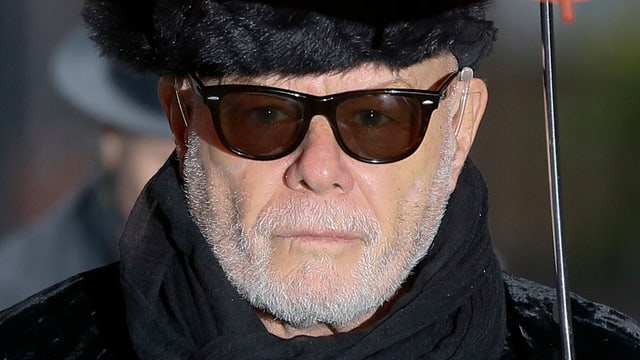 Gary Glitter mit dunkler Sonnenbrille. Gary Glitter mit dunkler Sonnenbrille.