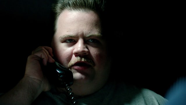 Nahaufnahme von Hauptdarsteller Paul Walter Hauser als Richard Jewell. Nahaufnahme von Hauptdarsteller Paul Walter Hauser als Richard Jewell.