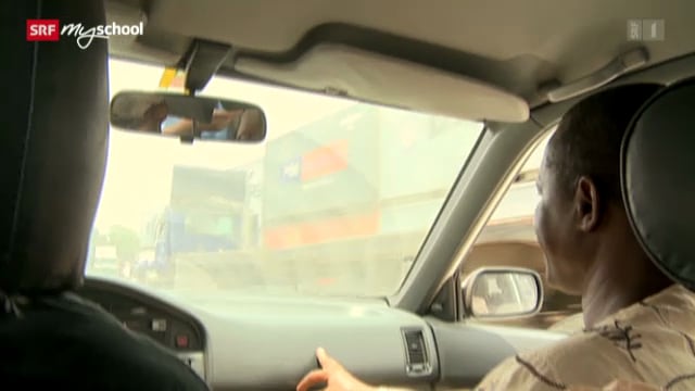 Mister Bah in einem Auto. Mister Bah in einem Auto.