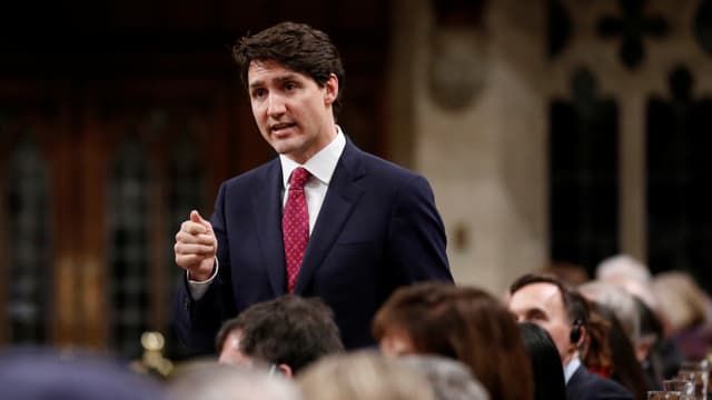 Justin Trudeau spricht zu einem Publikum. Justin Trudeau spricht zu einem Publikum.