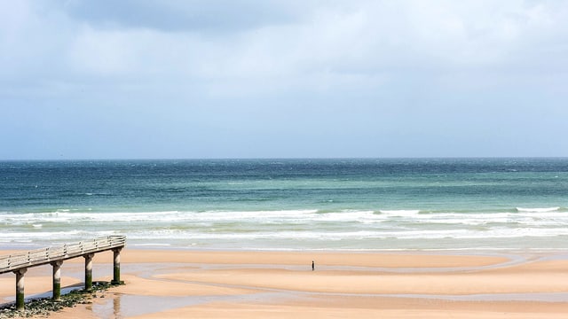 Malerischer Blick auf die Omaha Beach in der Normandie. Malerischer Blick auf die Omaha Beach in der Normandie.