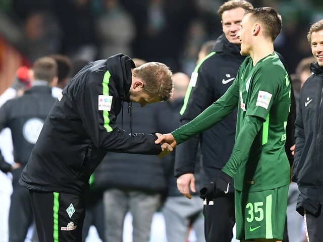 Fussballtrainer und Spieler von werder