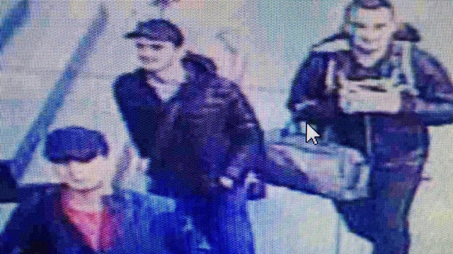 Drei Männer in dunklen Jacken Drei Männer in dunklen Jacken